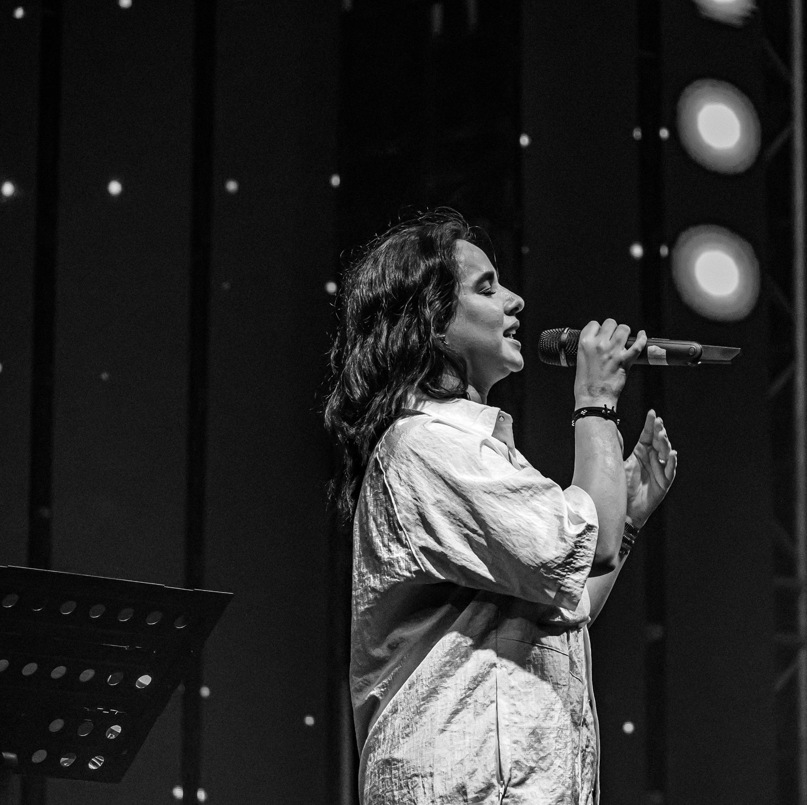 Zevela Creative event — vocalist in black and white